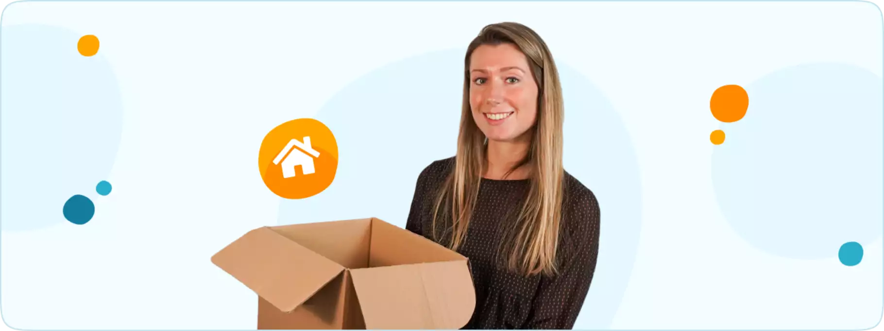 Vrouw houdt verhuisdoos vast