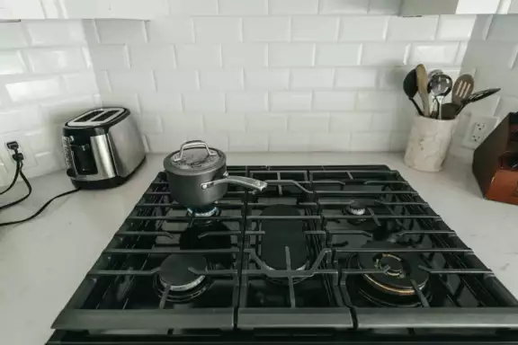 Vast gas dynamisch stroom Afbeelding van een gasfornuis