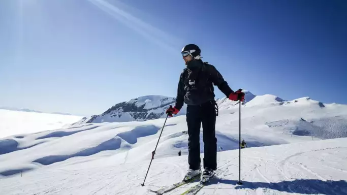 Afbeelding van skiër in de sneeuw