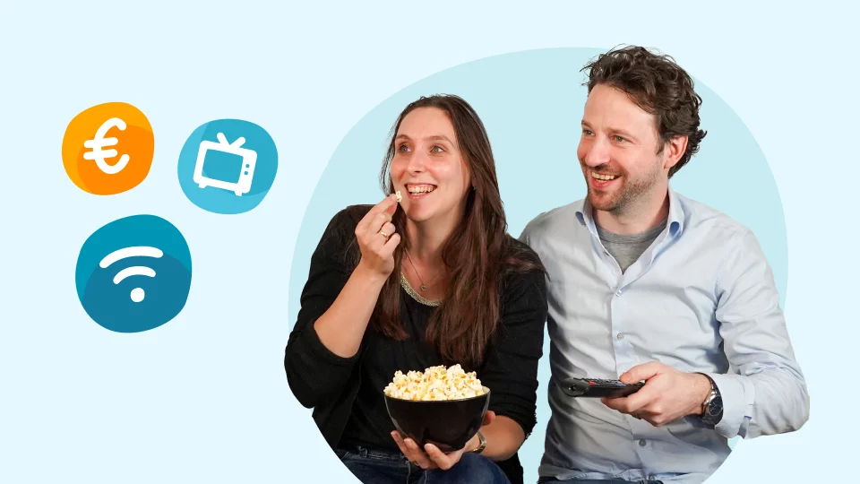 Man en vrouw kijken televisie