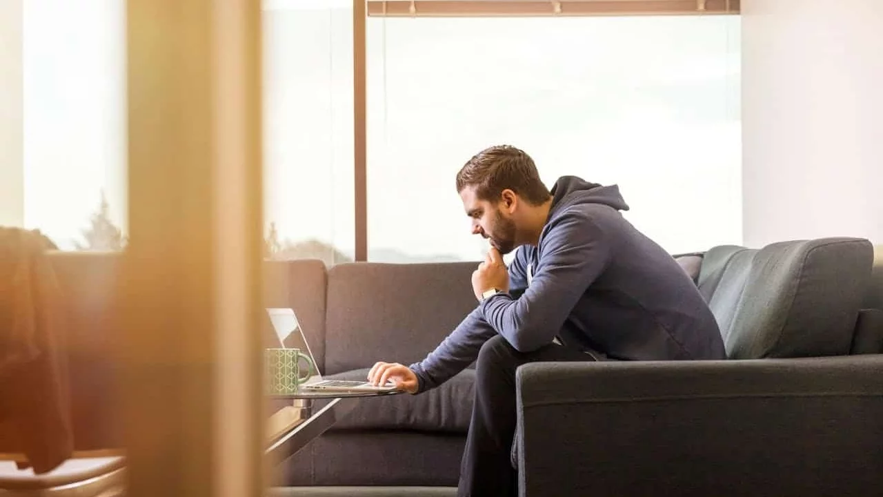 Man checking his laptop